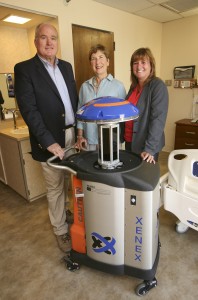 Bill and Gerry Brinton and SVH CEO Kelly Mather are shown with the Xenex Germ-Zapping Robot the Brintons donated to the hospital. The robot uses pulsed xenon ultraviolet light (UV) to quickly destroy bacteria, viruses, mold and other pathogens in patient areas throughout the hospital.